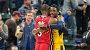 Mar 25, 2018; Indianapolis, IN, USA; Miami Heat guard Dwyane Wade (3) and Indiana Pacers guard Victor Oladipo (4) hug after s game at Bankers Life Fieldhouse. Mandatory Credit: Trevor Ruszkowski-Imagn Images