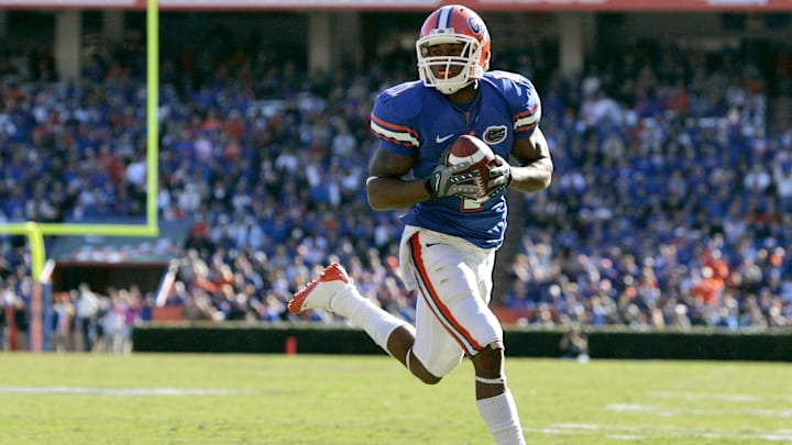 November 22, 2008; Gainesville FL, USA; Florida Gators running back Percy Harvin (1) runs the ball in for a touchdown against the Citadel Bulldogs during the first half at Ben Hill Griffin Stadium. Mandatory Credit: Kim Klement-Imagn Images