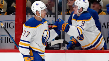 Oct 16, 2024; Pittsburgh, Pennsylvania, USA;  Buffalo Sabres right wing JJ Peterka (77) celebrates his goal with left wing Zach Benson (9) against the Pittsburgh Penguins during the first period at PPG Paints Arena. Mandatory Credit: Charles LeClaire-Imagn Images