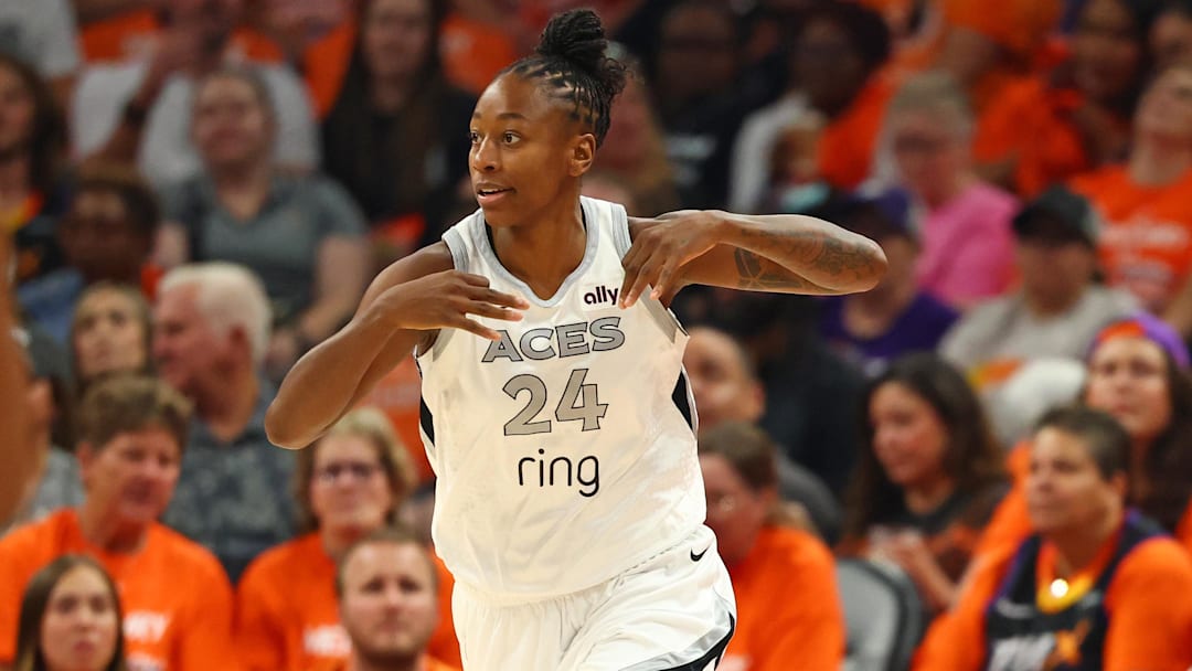 Oct 8, 2025; Phoenix, Arizona, USA; Las Vegas Aces guard Jewell Loyd (24) reacts after a three point basket against the Phoenix Mercury in the first half during game three of the 2025 WNBA Finals at PHX Arena. Mandatory Credit: Mark J. Rebilas-Imagn Images