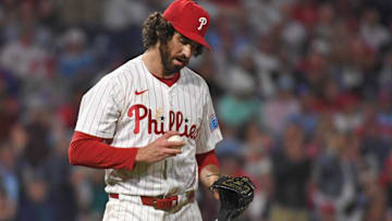 Aug 18, 2025; Philadelphia, Pennsylvania, USA;  Philadelphia Phillies pitcher Jordan Romano (68) gets a new baseball after allowing a home run during the seventh inning against the Seattle Mariners at Citizens Bank Park. Mandatory Credit: Eric Hartline-Imagn Images