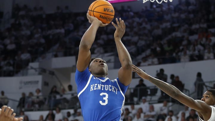 Kentucky Wildcats guard Adou Thiero (3) drives to the basket as Mississippi State Bulldogs guard Shawn Jones Jr. (5) defends during the second half at Humphrey Coliseum. 