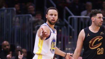 Nov 5, 2023; Cleveland, Ohio, USA; Golden State Warriors guard Steph Curry  (30) questions a call after losing a ball out of bounds while defended by Cleveland Cavaliers guard Georges Niang (20) in the second quarter at Rocket Mortgage FieldHouse. Mandatory Credit: Aaron Josefczyk-USA TODAY Sports
