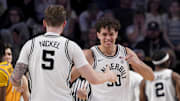 Vanderbilt guard Chris Manon, right, celebrates a play with guard Tyler Nickel. The Commodores are a likely NCAA tournament team.