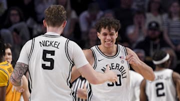 Vanderbilt guard Chris Manon, right, celebrates a play with guard Tyler Nickel. The Commodores are a likely NCAA tournament team.