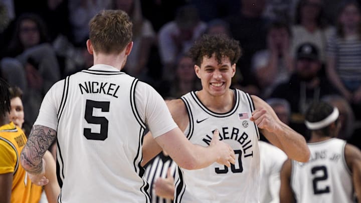 Vanderbilt guard Chris Manon, right, celebrates a play with guard Tyler Nickel. The Commodores are a likely NCAA tournament team.