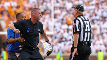 Sep 24, 2022; Knoxville, Tennessee, USA; Florida Gators head coach Billy Napier argues with an official during the second half against the Tennessee Volunteers at Neyland Stadium. Mandatory Credit: Randy Sartin-Imagn Images