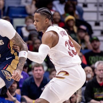Mar 13, 2024; New Orleans, Louisiana, USA; New Orleans Pelicans forward Brandon Ingram (14) dribbles against Cleveland Cavaliers forward Isaac Okoro (35) during the first half at Smoothie King Center. Mandatory Credit: Stephen Lew-USA TODAY Sports