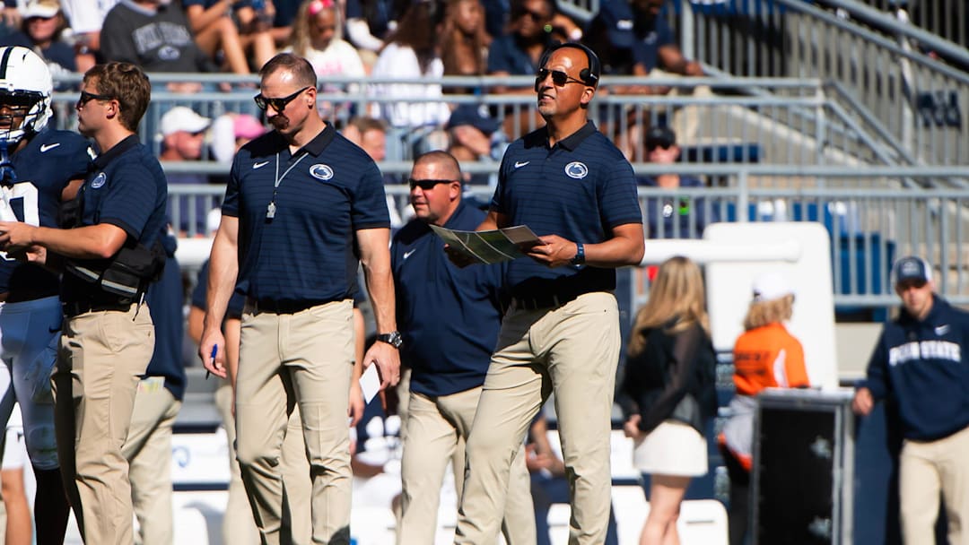 Penn State head coach James Franklin, center, in the first half of an NCAA football game against Nevada.