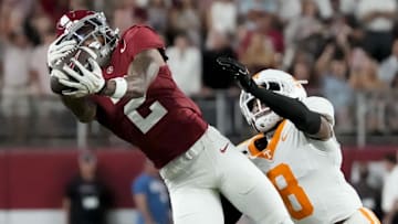 Oct 18, 2025; Tuscaloosa, Alabama, USA; Alabama Crimson Tide wide receiver Ryan Williams (2) makes a catch while being defended by Tennessee Volunteers defensive back Colton Hood (8) at Saban Field at Bryant-Denny Stadium. Mandatory Credit: Gary Cosby-USA TODAY Network via Imagn Images