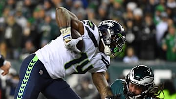 Jan 5, 2020; Philadelphia, Pennsylvania, USA; Seattle Seahawks wide receiver D.K. Metcalf (14) carries the ball after a catch as Philadelphia Eagles cornerback Avonte Maddox (29) attempts to make the tackle during the third quarter in a NFC Wild Card playoff football game at Lincoln Financial Field. Mandatory Credit: Eric Hartline-Imagn Images