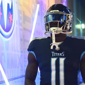 Jan 22, 2022; Nashville, Tennessee, USA; Tennessee Titans wide receiver A.J. Brown (11) takes the field before the game against the Cincinnati Bengals during a AFC Divisional playoff football game at Nissan Stadium. Mandatory Credit: Christopher Hanewinckel-Imagn Images