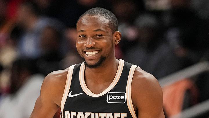 Feb 26, 2026; Atlanta, Georgia, USA; Atlanta Hawks forward Jonathan Kuminga (0) reacts after making a three point shot against the Washington Wizards during the first half at State Farm Arena. Mandatory Credit: Dale Zanine-Imagn Images