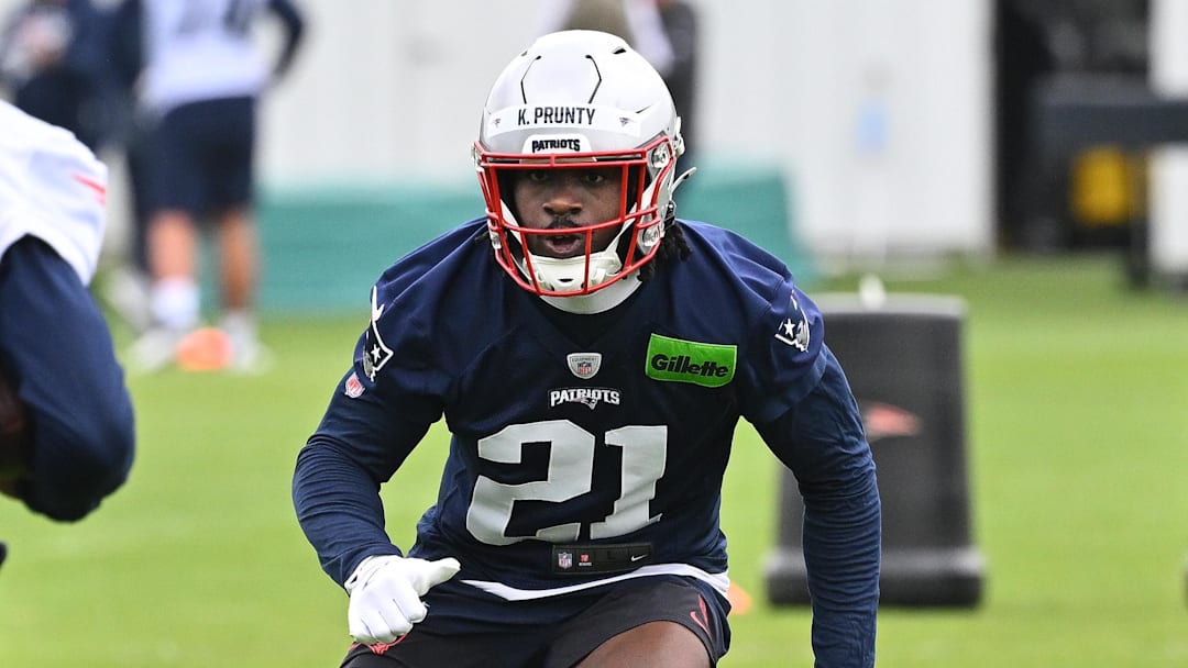 May 9, 2026; Foxborough, MA, USA; New England Patriots cornerback Karon Prunty (21) does a drill with wide receiver Cameron Dorner (88) during the New England Patriots rookie camp at Gillette Stadium. Mandatory Credit: Eric Canha-Imagn Images