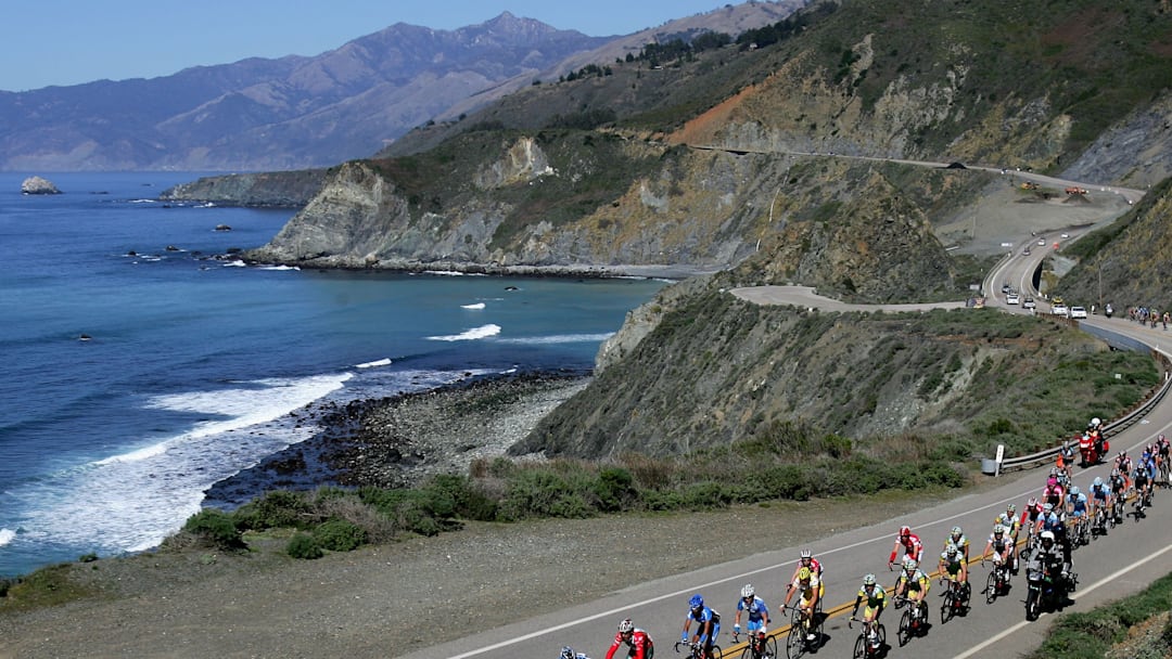People riding bikes down the Pacific Coast Highway People riding bikes down the Pacific Coast Highway