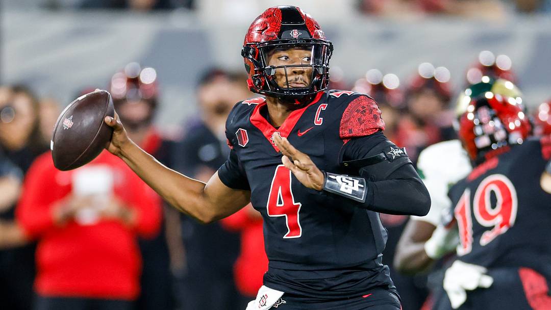 Oct 3, 2025; San Diego, California, USA; San Diego State Aztecs quarterback Jayden Denegal (4). Oct 3, 2025; San Diego, California, USA; San Diego State Aztecs quarterback Jayden Denegal (4).