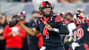 Oct 3, 2025; San Diego, California, USA; San Diego State Aztecs quarterback Jayden Denegal (4) throws a pass during the first half against the Colorado State Rams at Snapdragon Stadium. 