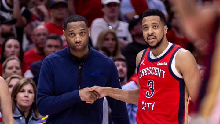 Apr 16, 2024; New Orleans, Louisiana, USA; New Orleans Pelicans head coach Willie Green talks with guard CJ McCollum (3) on a free throw attempt against the Los Angeles Lakers during the second half of a play-in game of the 2024 NBA playoffs at Smoothie King Center. Mandatory Credit: Stephen Lew-USA TODAY Sports