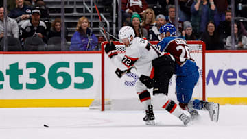 Oct 27, 2024; Denver, Colorado, USA; Ottawa Senators defenseman Thomas Chabot (72) chases down a loose puck against Colorado Avalanche center Ross Colton (20) on an open net in the third period at Ball Arena. Mandatory Credit: Isaiah J. Downing-Imagn Images