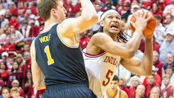 Indiana's Malik Reneau (5) looks to shoot over Michigan's Danny Wolf (1) during the Indiana versus Michigan mens basketball game at Simon Skjodt Assembly Hall on Saturday, Feb. 8, 2025.