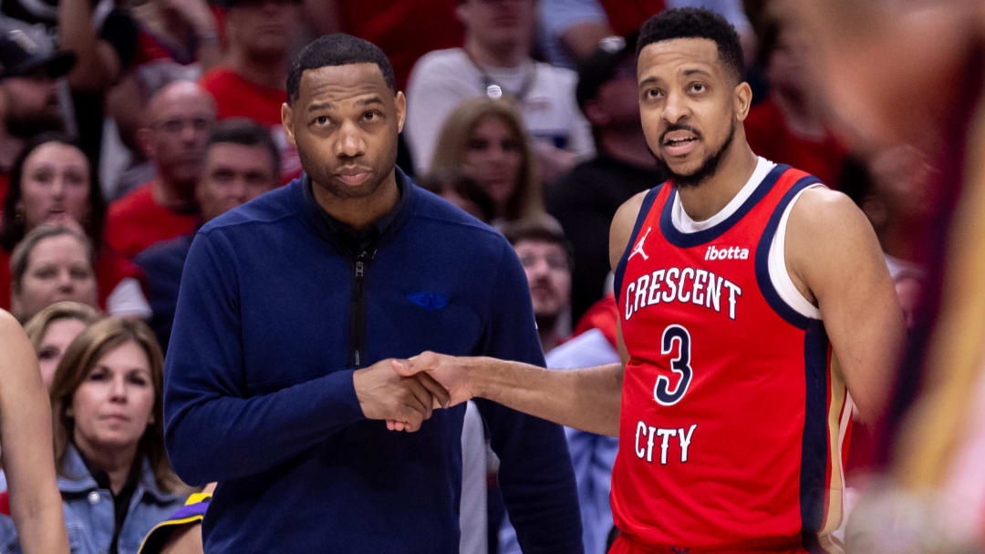 Apr 16, 2024; New Orleans, Louisiana, USA; New Orleans Pelicans head coach Willie Green talks with guard CJ McCollum (3) on a free throw attempt against the Los Angeles Lakers during the second half of a play-in game of the 2024 NBA playoffs at Smoothie King Center