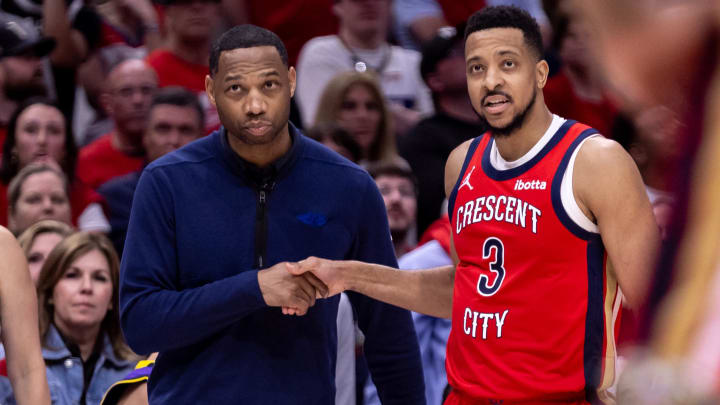 Apr 16, 2024; New Orleans, Louisiana, USA; New Orleans Pelicans head coach Willie Green talks with guard CJ McCollum (3) on a free throw attempt against the Los Angeles Lakers during the second half of a play-in game of the 2024 NBA playoffs at Smoothie King Center