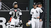 Chicago White Sox catcher Edgar Quero (7) and starting pitcher Davis Martin (65) leave the bullpen prior to Thursday's game against the Athletics at Rate Field.