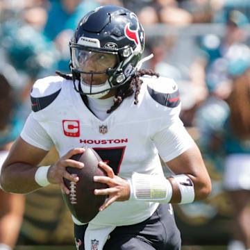 Houston Texans quarterback C.J. Stroud runs with the ball during the second quarter against the Jacksonville Jaguars.