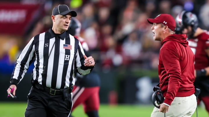 Nov 25, 2023; Columbia, South Carolina, USA; South Carolina Gamecocks head coach Shane Beamer disputes a call in the second quarter against the Clemson Tigers at Williams-Brice Stadium. Mandatory Credit: Jeff Blake-USA TODAY Sports