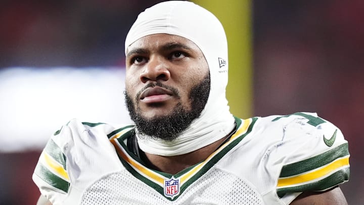 Dec 14, 2025; Denver, Colorado, USA; Green Bay Packers defensive end Micah Parsons (1) walks off the field with help from medical personnel following an injury during the third quarter against the Denver Broncos at Empower Field at Mile High. Mandatory Credit: Ron Chenoy-Imagn Images