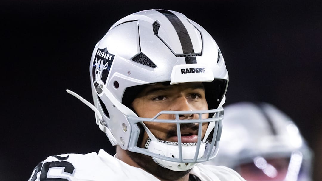 Aug 23, 2025; Glendale, Arizona, USA; Las Vegas Raiders guard Caleb Rogers (76) against the Arizona Cardinals during a preseason NFL game at State Farm Stadium. Mandatory Credit: Mark J. Rebilas-Imagn Images