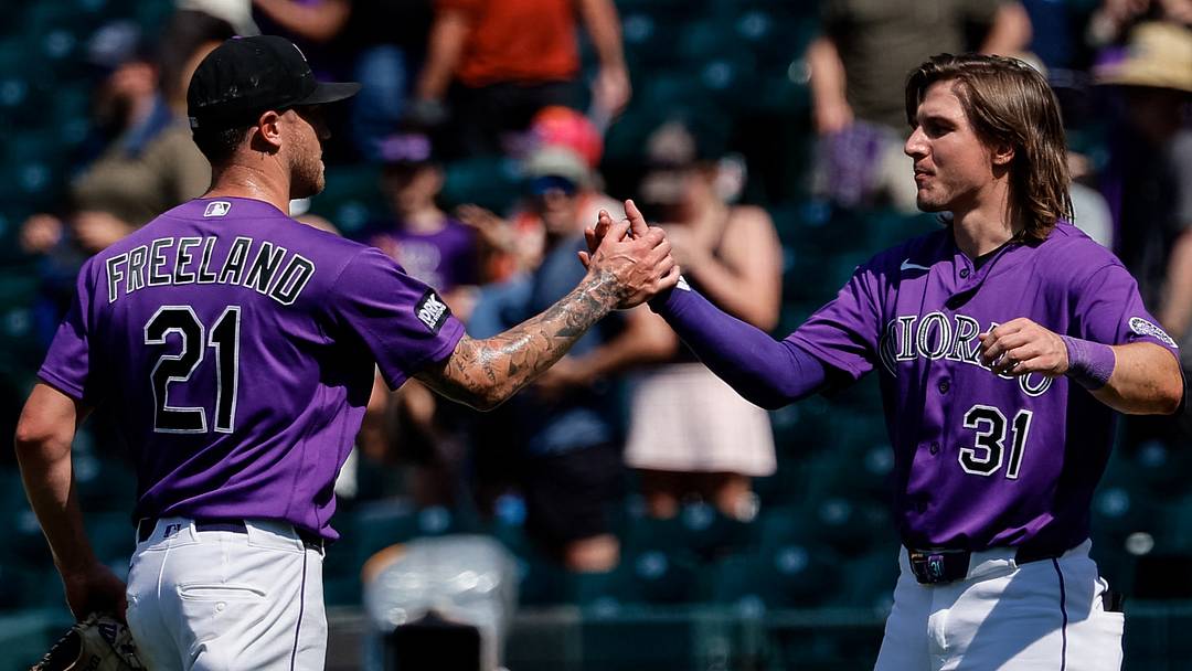 Colorado Rockies starting pitcher Kyle Freeland (21) celebrates with designated hitter Jake McCarthy (31) after the game.  Credit: Isaiah J. Downing-Imagn Images
