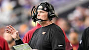 Dec 7, 2025; Minneapolis, Minnesota, USA; Washington Commanders head coach Dan Quinn during the first half at U.S. Bank Stadium. Mandatory Credit: Jeffrey Becker-Imagn Images
