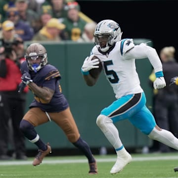Carolina Panthers running back Rico Dowdle (5) sprints and picks up 29 yards during the second quarter of their game against the Green Bay Packers Sunday, November 2, 2025 at Lambeau Field in Green Bay, Wisconsin.