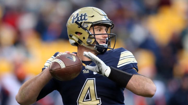 Nov 26, 2016; Pittsburgh, PA, USA;  Pittsburgh Panthers quarterback Nathan Peterman (4) passes against the Syracuse Orange during the third quarter at Heinz Field. PITT won 76-61. Mandatory Credit: Charles LeClaire-USA TODAY Sports