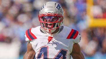 New England Patriots linebacker K'Lavon Chaisson (44) celebrates his sack of Tennessee Titans quarterback Cam Ward (1) during the third quarter at Nissan Stadium in Nashville, Tenn., Sunday, Oct. 19, 2025.