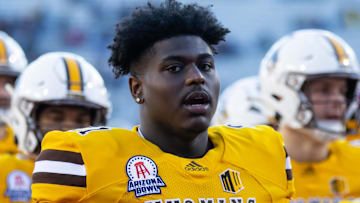 Dec 30, 2022; Tucson, AZ, USA; Wyoming Cowboys defensive tackle Jaden Williams (91) against the Ohio Bobcats during the 2022 Barstool Sports Arizona Bowl at Arizona Stadium. Mandatory Credit: Mark J. Rebilas-Imagn Images