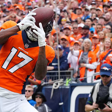 Sep 10, 2023; Denver, Colorado, USA; Denver Broncos wide receiver Lil'Jordan Humphrey (17) pulls in a touchdown in the first quarter against the Las Vegas Raiders at Empower Field at Mile High. Mandatory Credit: Ron Chenoy-Imagn Images