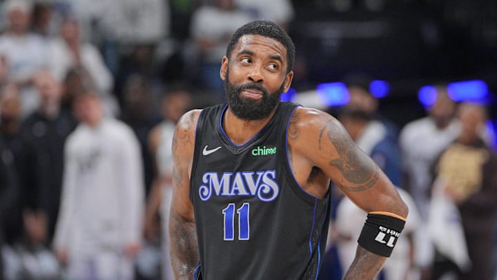 May 24, 2024; Minneapolis, Minnesota, USA; Dallas Mavericks guard Kyrie Irving (11) reacts in the fourth quarter against the Minnesota Timberwolves in game two of the western conference finals for the 2024 NBA playoffs at Target Center. Mandatory Credit: Brad Rempel-Imagn Images