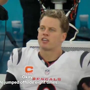 Joe Burrow complains to his coach about how poorly the team played.