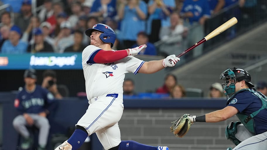 Toronto Blue Jays catcher Alejandro Kirk singles in the sixth inning against the Seattle Mariners.