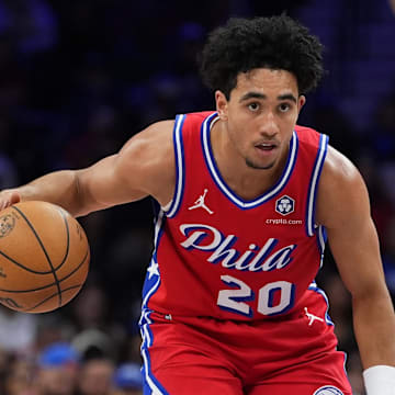 Dec 6, 2024; Philadelphia, Pennsylvania, USA; Philadelphia 76ers guard Jared McCain (20) controls the ball against the Orlando Magic in the fourth quarter at Wells Fargo Center. Mandatory Credit: Kyle Ross-Imagn Images