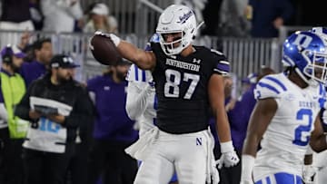 Sep 6, 2024; Evanston, Illinois, USA; Northwestern Wildcats tight end Thomas Gordon (87) gestures after a first down against the Duke Blue Devils during the first half at Lanny and Sharon Martin Stadium. Mandatory Credit: David Banks-Imagn Images