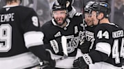 Apr 5, 2025; Los Angeles, California, USA; Los Angeles Kings defenseman Drew Doughty (8), left wing Andrei Kuzmenko (center), and defenseman Mikey Anderson (44)) are all smiles after Kuzmenko’s goal in the second period against the Edmonton Oilers at Crypto.com Arena. Mandatory Credit: Robert Hanashiro-Imagn Images
