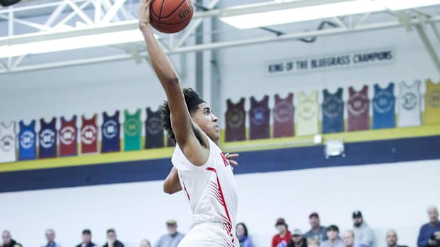 Newport's Taylen Kinney (0) goes up