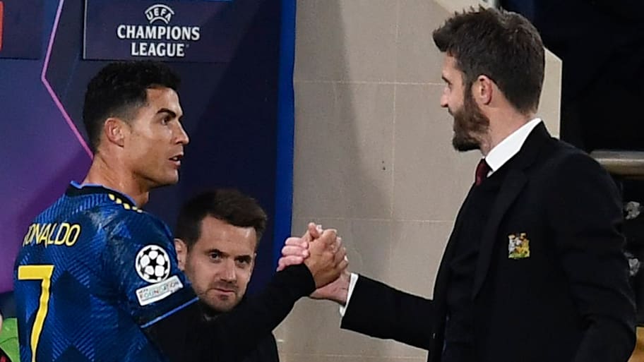 Cristiano Ronaldo (left) and Michael Carrick.