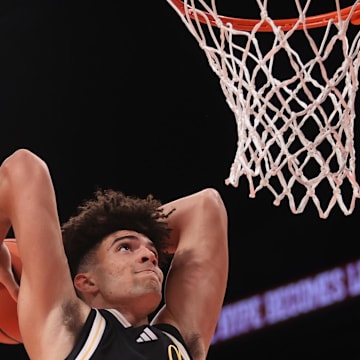 McDonald's All American East forward Cameron Boozer (12) dunks the ball during the second half of the game at Barclays Center.