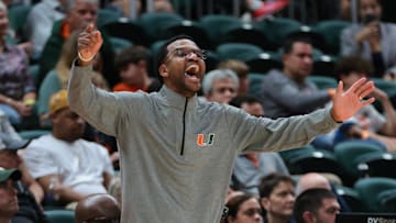 Nov 3, 2025; Coral Gables, Florida, USA; Miami Hurricanes head coach Jai Lucas reacts against the Jacksonville Dolphins during the second half at Watsco Center. Mandatory Credit: Sam Navarro-Imagn Images