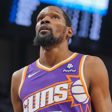 Apr 23, 2024; Minneapolis, Minnesota, USA; Phoenix Suns forward Kevin Durant (35) walks back to the bench against the Minnesota Timberwolves in the second quarter during game two of the first round for the 2024 NBA playoffs at Target Center. Mandatory Credit: Brad Rempel-USA TODAY Sports