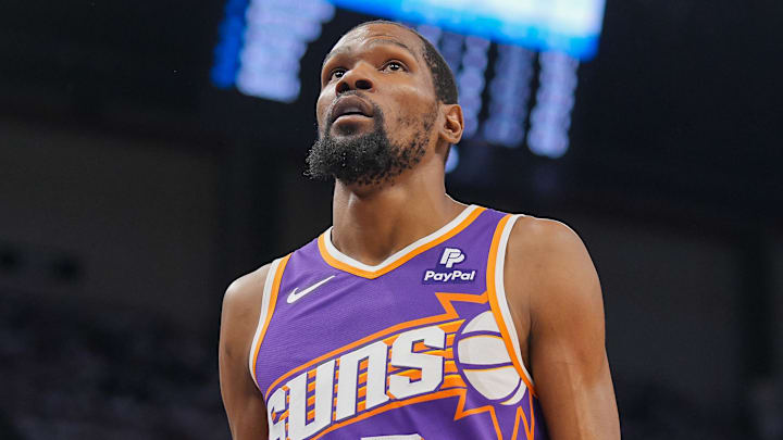 Apr 23, 2024; Minneapolis, Minnesota, USA; Phoenix Suns forward Kevin Durant (35) walks back to the bench against the Minnesota Timberwolves in the second quarter during game two of the first round for the 2024 NBA playoffs at Target Center. Mandatory Credit: Brad Rempel-Imagn Images